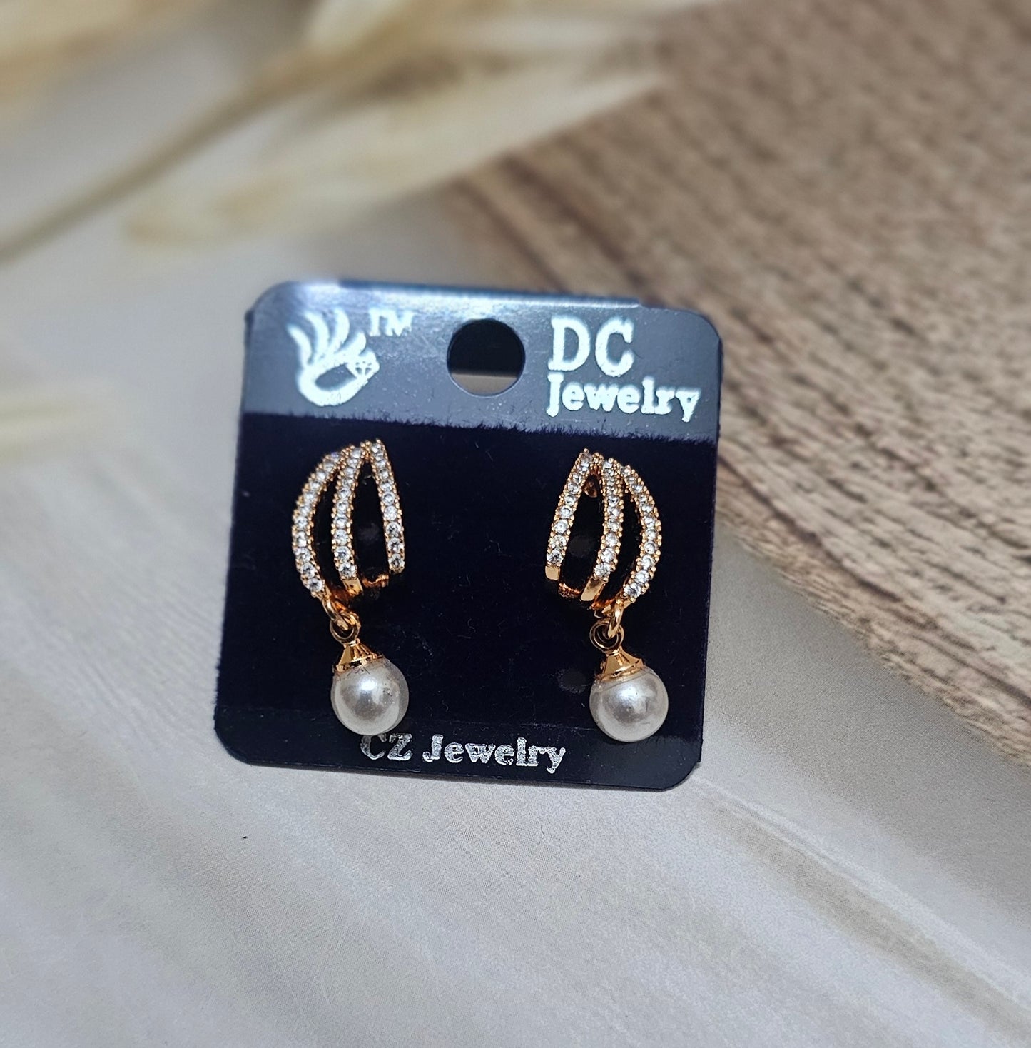 DC pearl drop stud