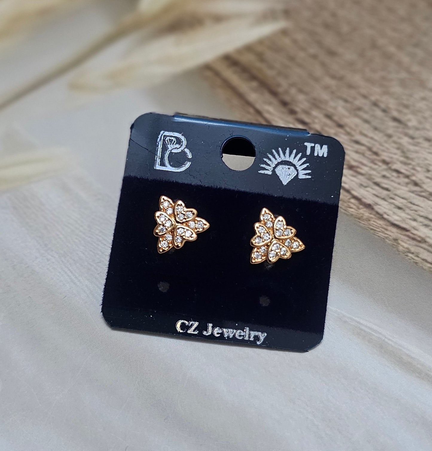 Triangle floral stud