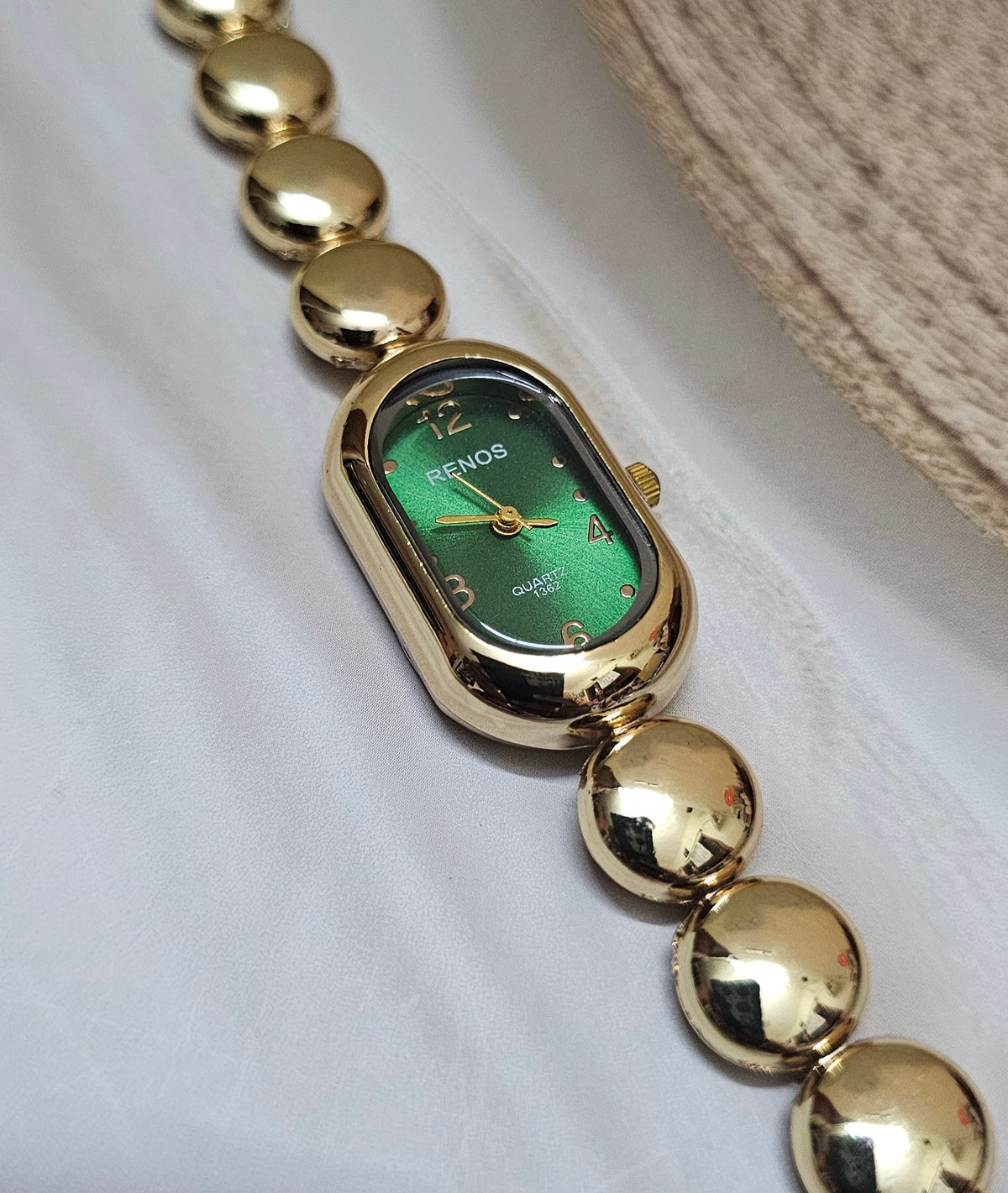 Kiyu Ziyu Emerald & Gold Bubble Link Watch
